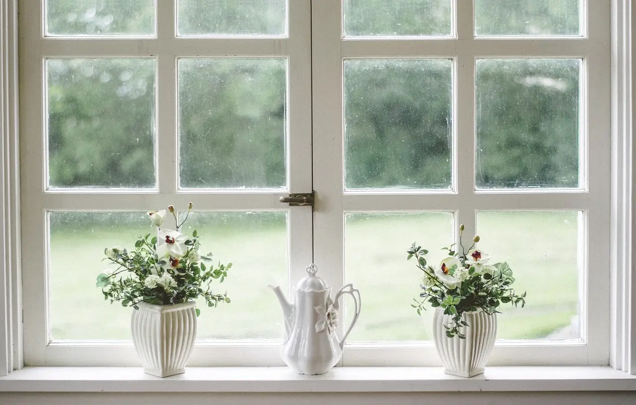 What causes interior glass spots?