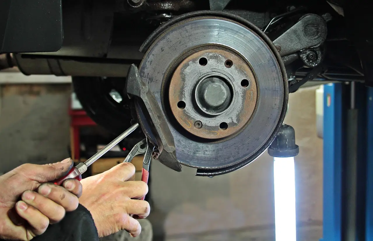 What brake hardware should be replaced with pads?